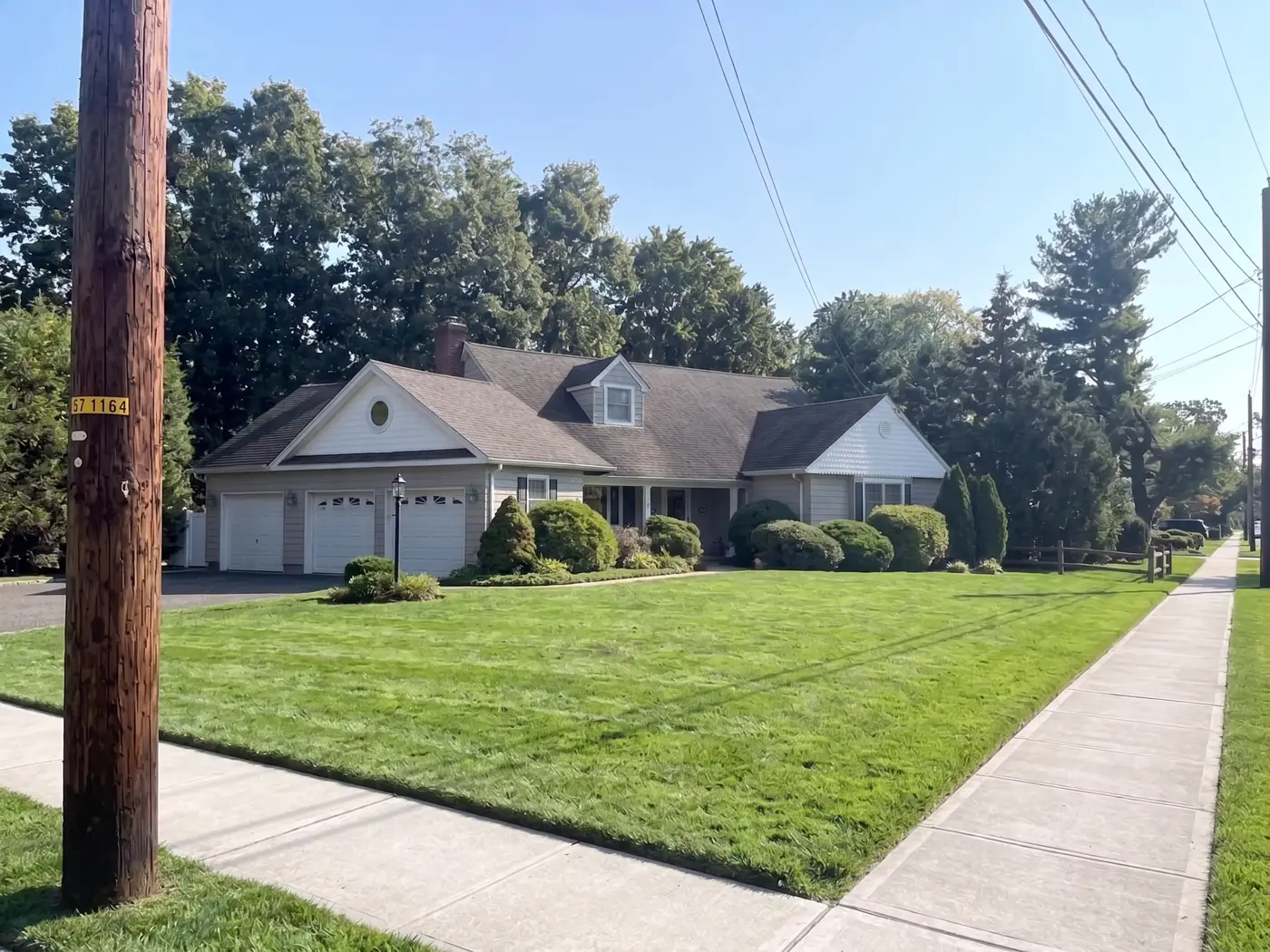 A thick green front lawn at a customer's home